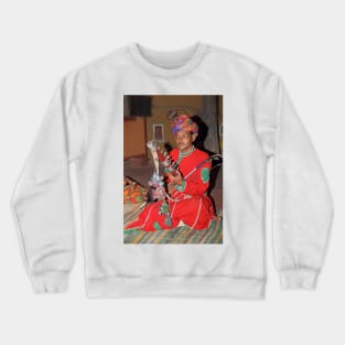 Musician at the Chocki Dani Village in Rajasthan, India Crewneck Sweatshirt